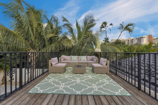 wooden terrace featuring outdoor lounge area