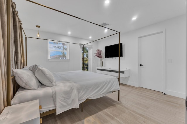 bedroom featuring light wood-type flooring