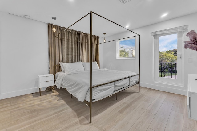 bedroom featuring light hardwood / wood-style floors