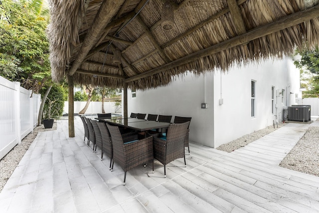 wooden deck featuring a gazebo and central AC