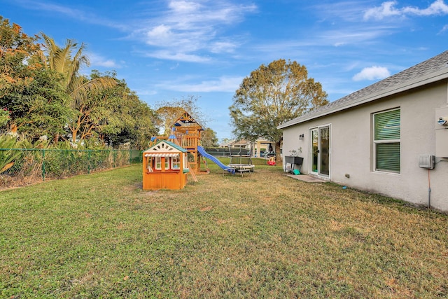 view of yard with a playground