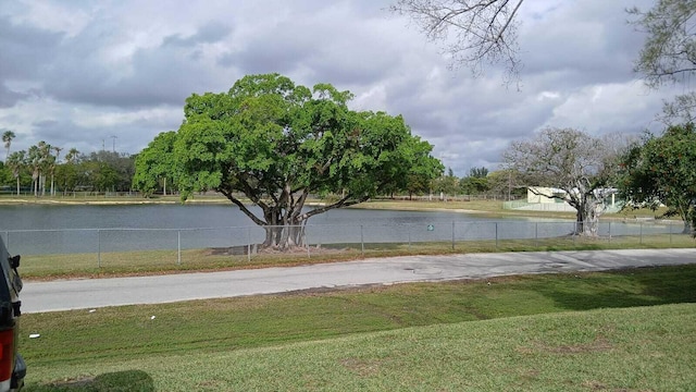 2365 NW 68th St, Miami, FL 33147 - view of yard with a water view