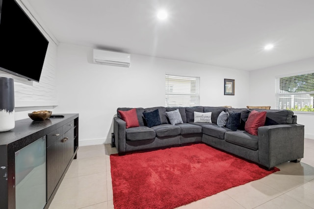 2365 NW 68th St, Miami, FL 33147 - living room featuring an AC wall unit, recessed lighting, light tile patterned floors, and baseboards