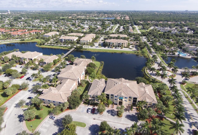 drone / aerial view with a water view