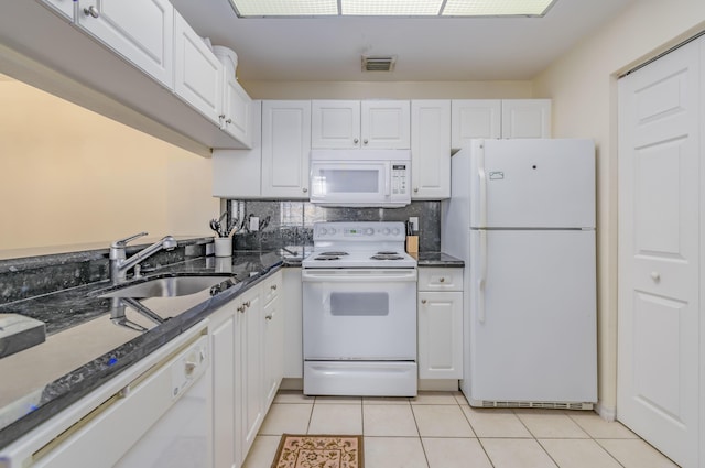 kitchen featuring white cabinets, white appliances, and sink