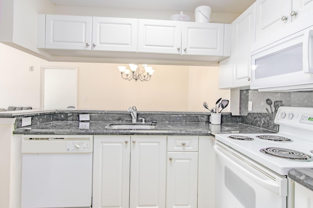 kitchen featuring white cabinetry, sink, an inviting chandelier, tasteful backsplash, and white appliances