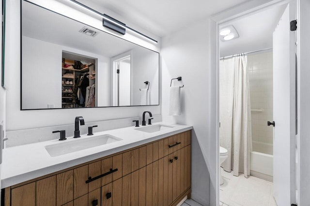 full bathroom with tile patterned floors, vanity, shower / bath combination with curtain, and toilet