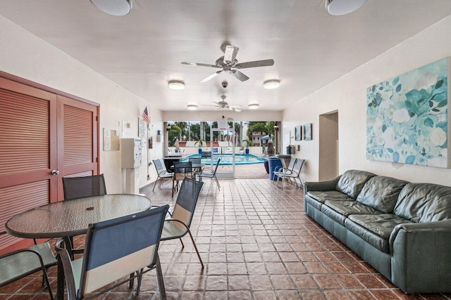 interior space featuring ceiling fan