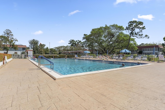 view of pool featuring a patio area