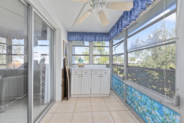 interior space featuring ceiling fan