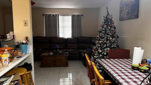 living room featuring light tile patterned flooring