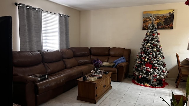 living area with light tile patterned flooring