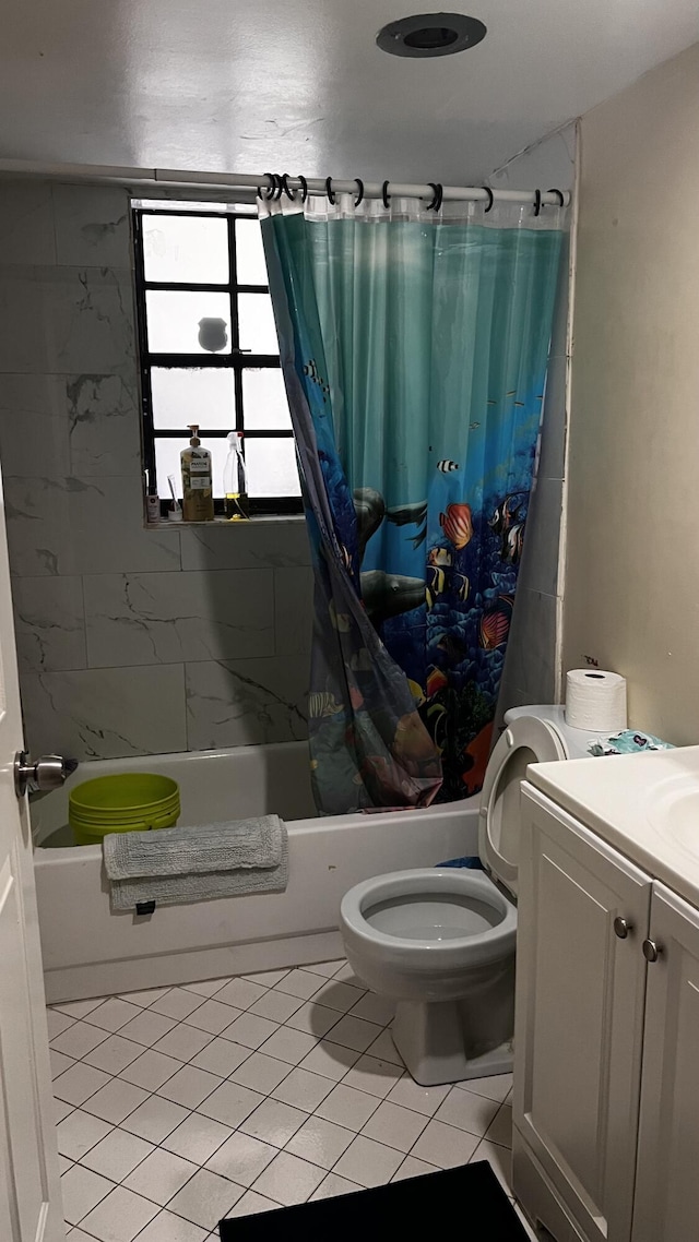 full bathroom with tile patterned floors, vanity, shower / bath combination with curtain, and toilet