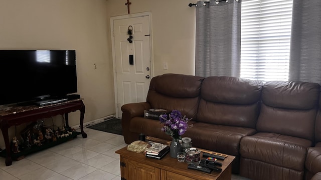 living area with light tile patterned floors