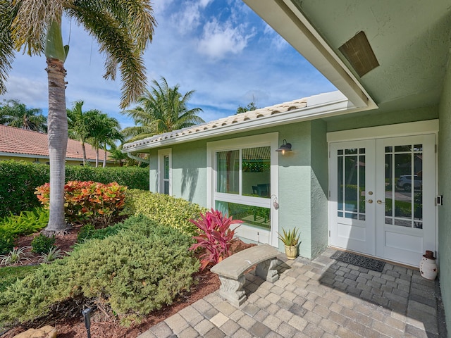 view of exterior entry with french doors