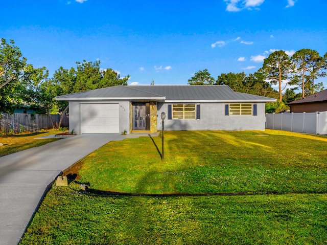 single story home featuring a front yard and a garage