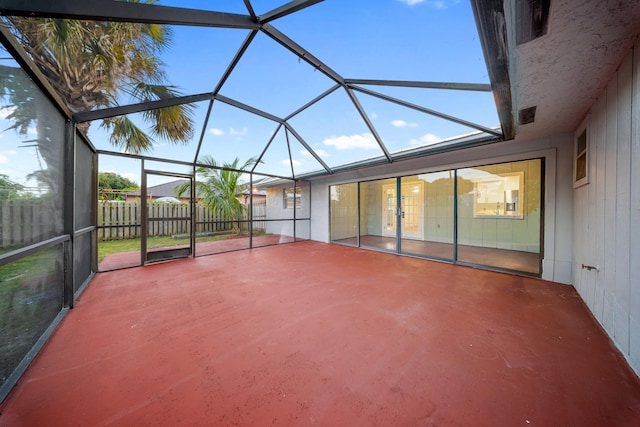 unfurnished sunroom featuring a healthy amount of sunlight