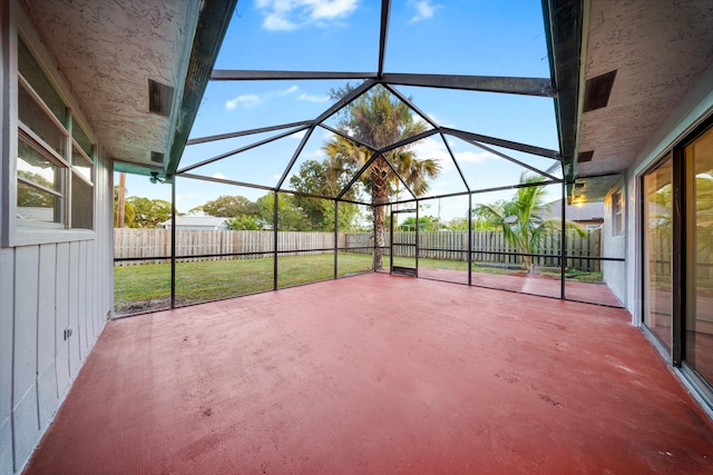 view of patio with a lanai