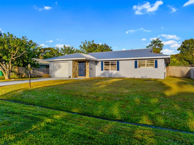 ranch-style house with a front yard and a garage