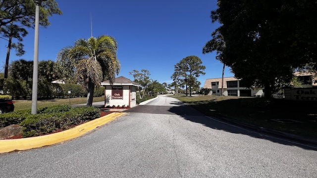 view of street featuring curbs