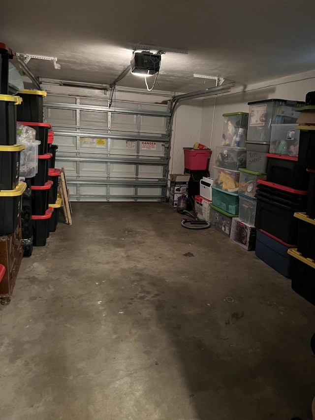 garage featuring a garage door opener