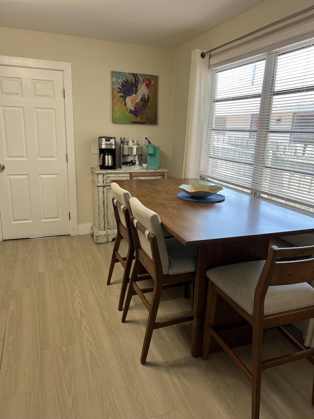 dining room featuring light hardwood / wood-style flooring