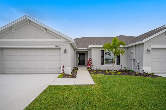 ranch-style house with a front yard and a garage