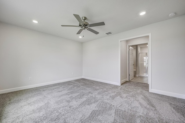 carpeted empty room with ceiling fan