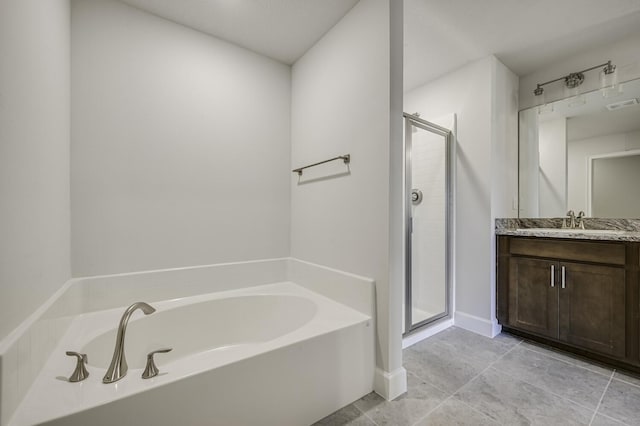 bathroom featuring vanity and plus walk in shower