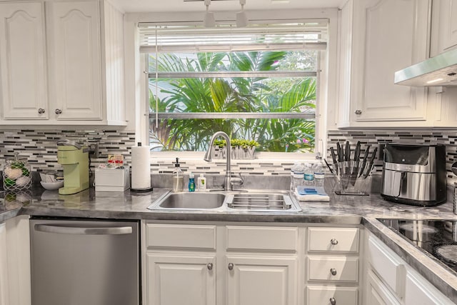 kitchen with dishwasher, white cabinetry, a healthy amount of sunlight, and sink