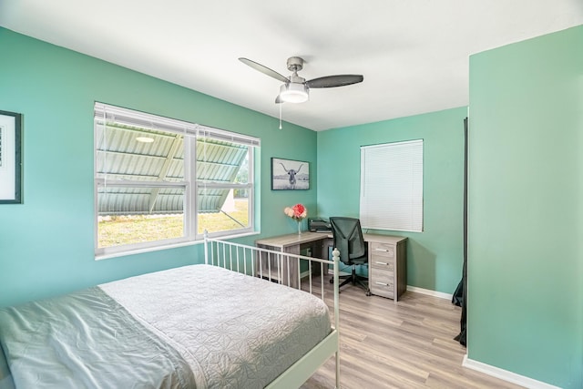 bedroom featuring ceiling fan and light hardwood / wood-style floors