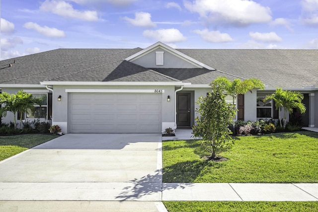 ranch-style house with a front yard and a garage