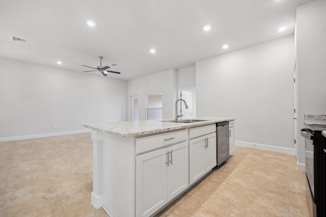 kitchen with a center island with sink, white cabinets, sink, electric range, and ceiling fan