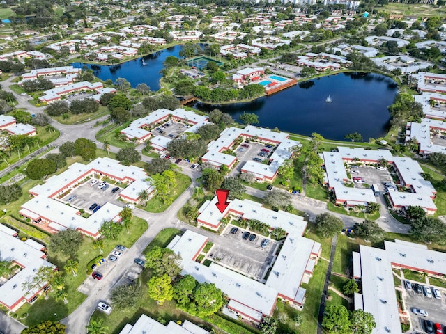 drone / aerial view with a water view