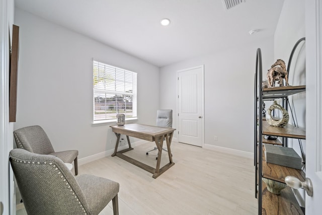 home office featuring light wood-type flooring