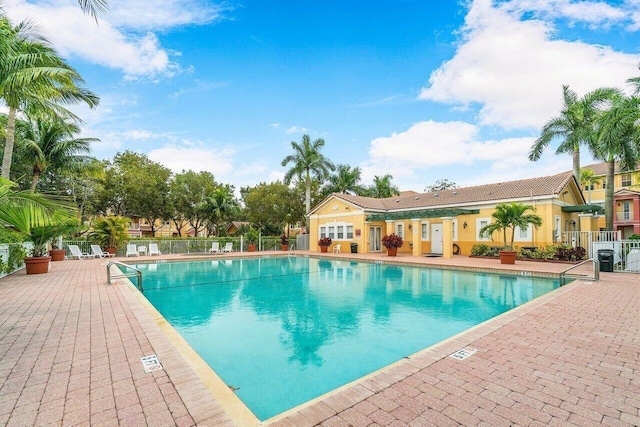 view of swimming pool featuring a patio area