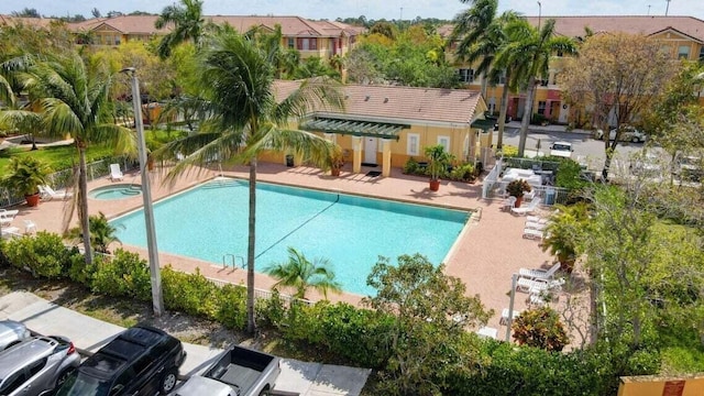 view of swimming pool featuring a patio area