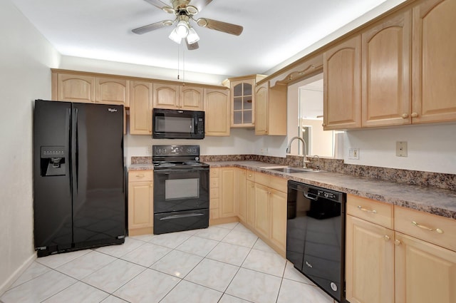 kitchen with ceiling fan, sink, light brown cabinetry, light tile patterned flooring, and black appliances