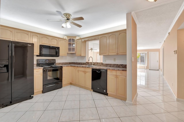 kitchen with crown molding, sink, ceiling fan, and black appliances