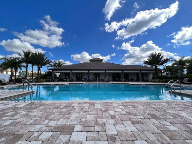 view of pool featuring a patio area