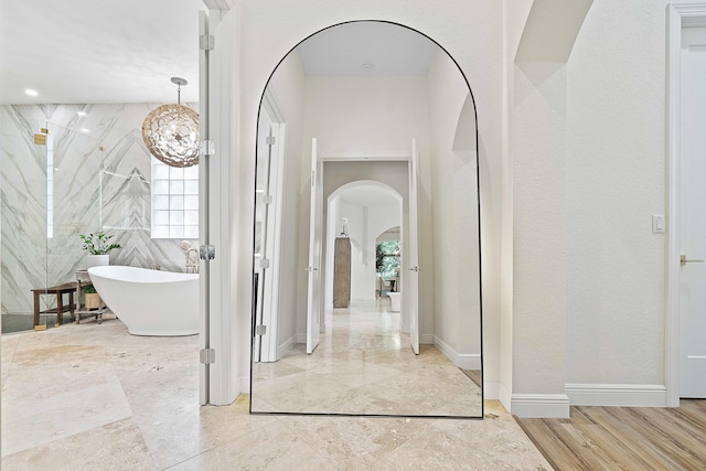 hallway featuring wood-type flooring