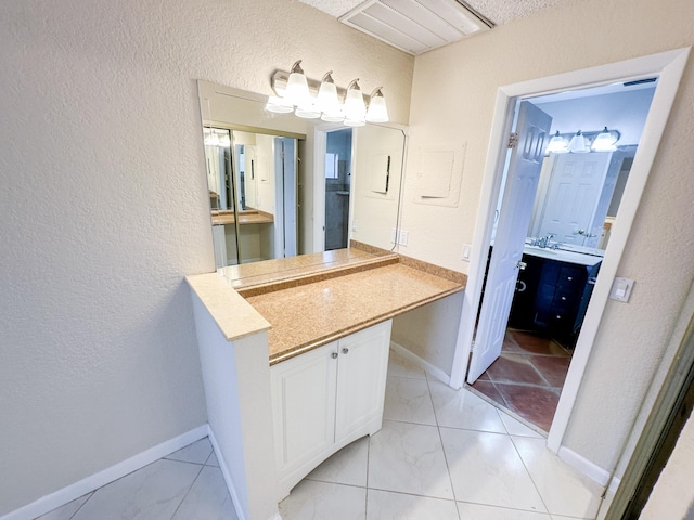 bathroom with tile patterned floors