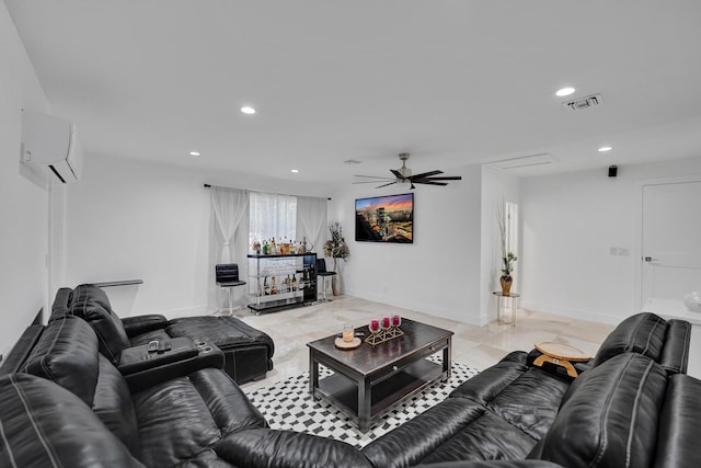 living room featuring ceiling fan and an AC wall unit