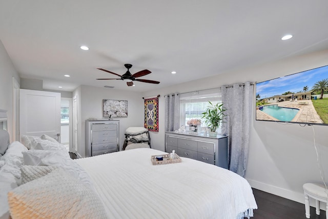 bedroom featuring dark hardwood / wood-style flooring and ceiling fan