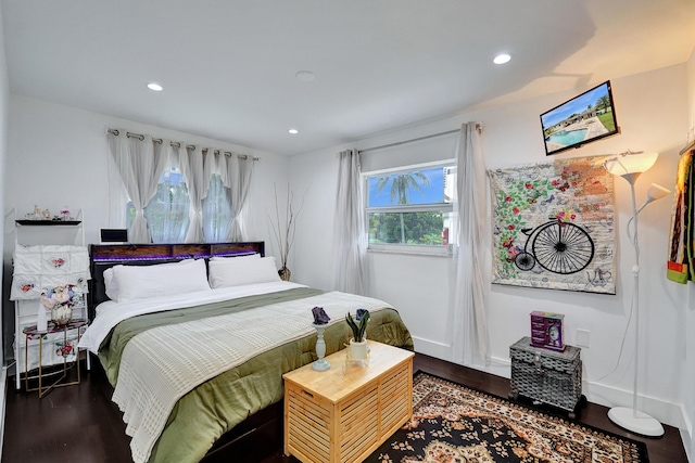 bedroom featuring dark hardwood / wood-style floors