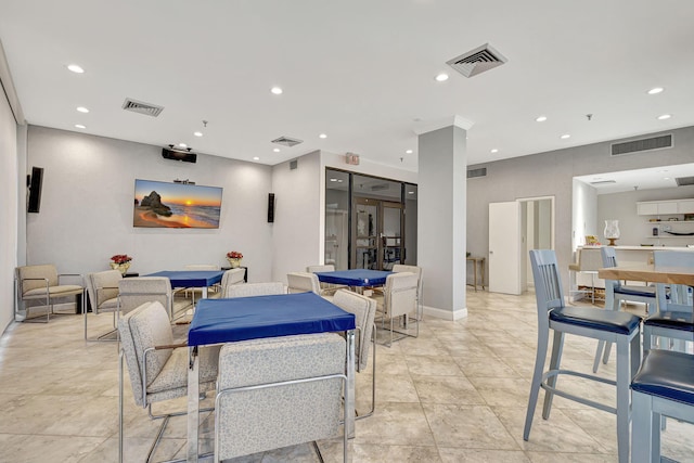 dining room with light tile patterned flooring and pool table