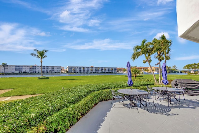 view of patio / terrace with a water view