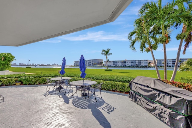 view of patio / terrace featuring a water view