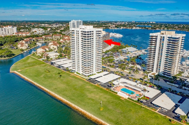 birds eye view of property with a water view