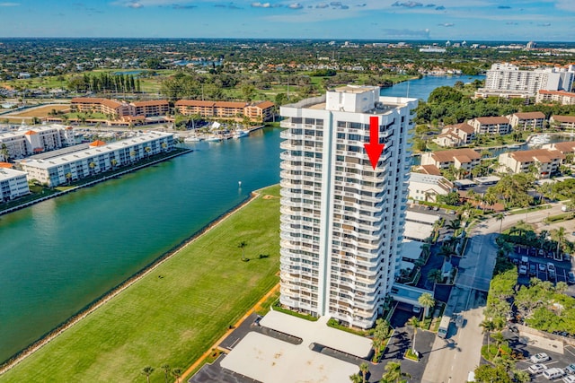 birds eye view of property featuring a water view